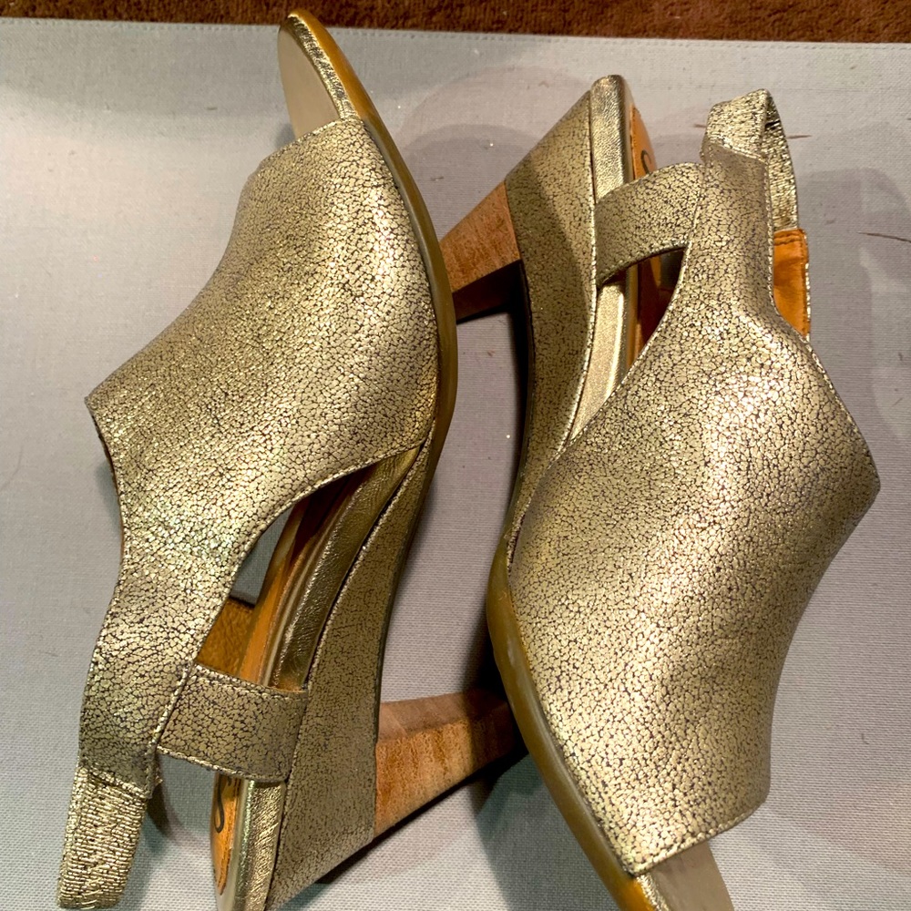 Softy gold leather shoes size 7, worn once. Beautiful for holiday parties.